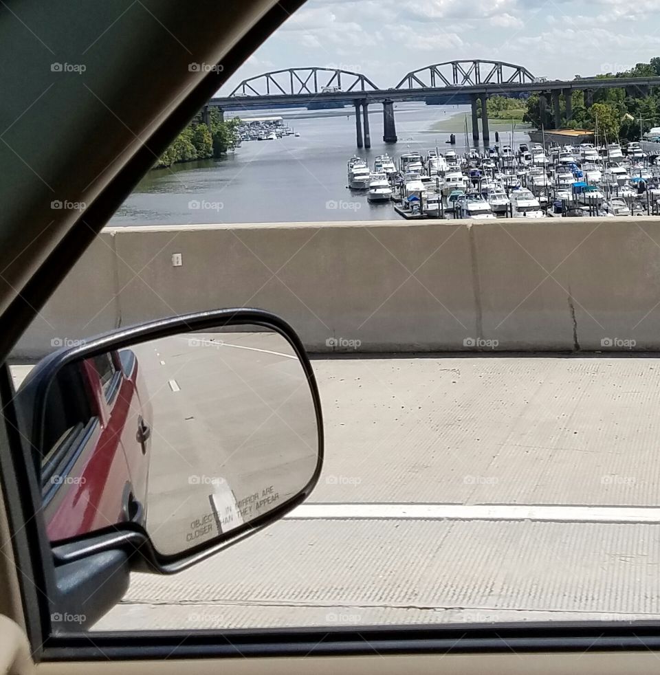 Driving on the Purples Heart Bridge looking over.... House Boats on the Occoquan River.  And the Railroad bridge.