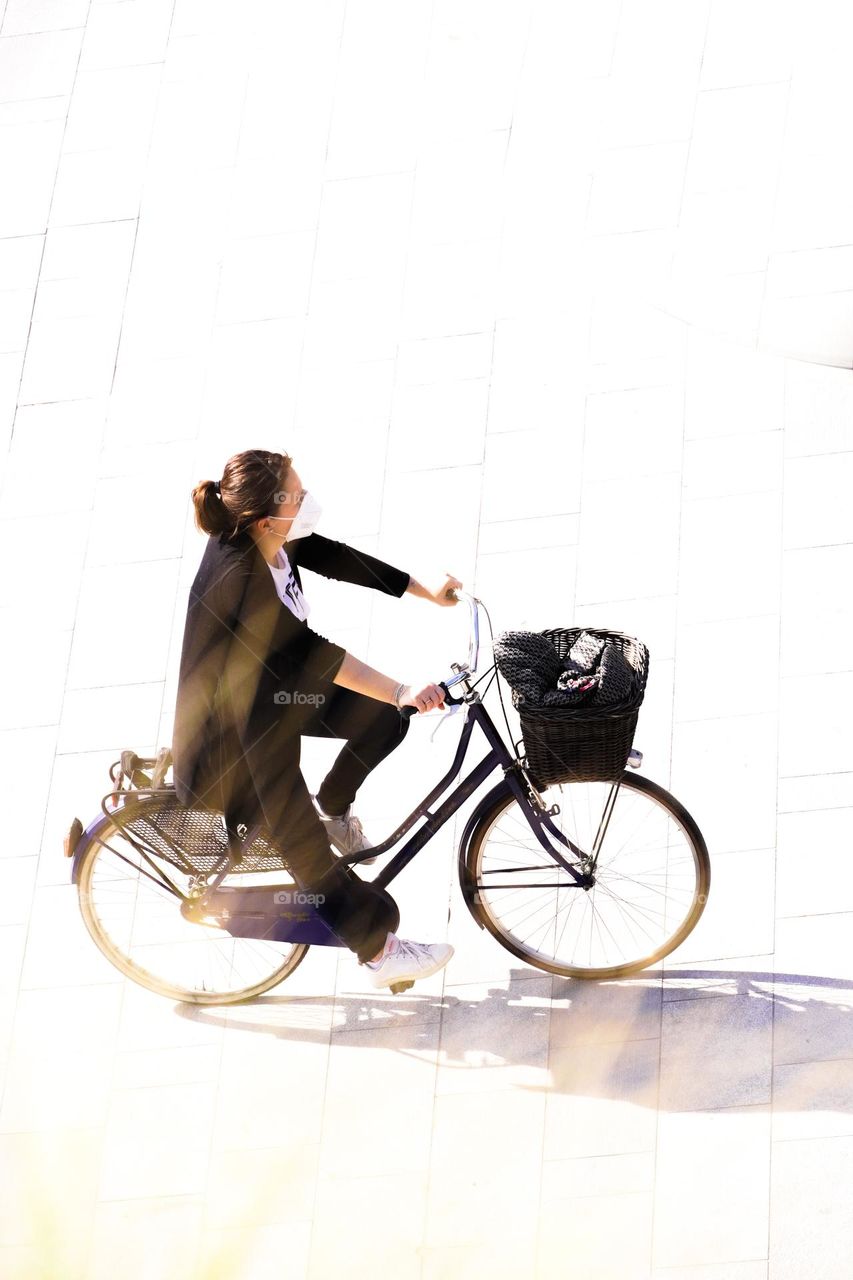 Woman is riding the bicycle 