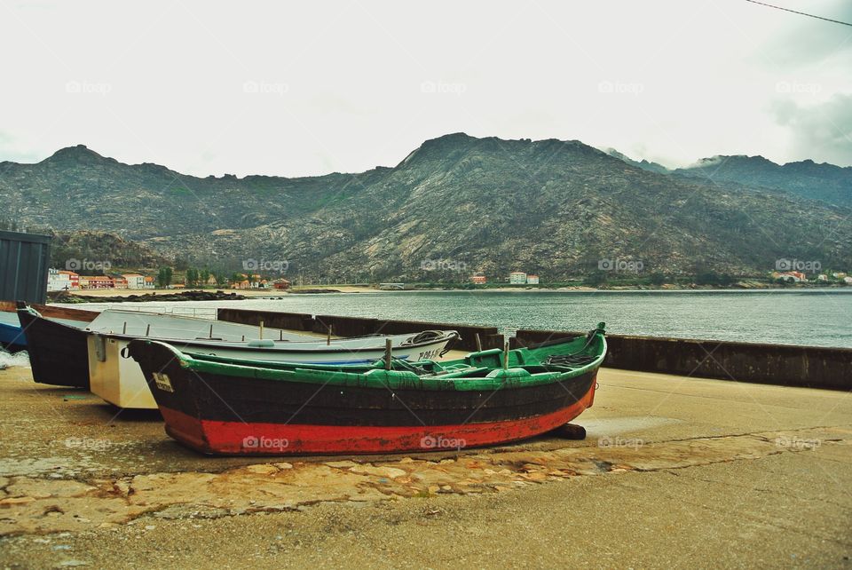 fishing boats on the shore