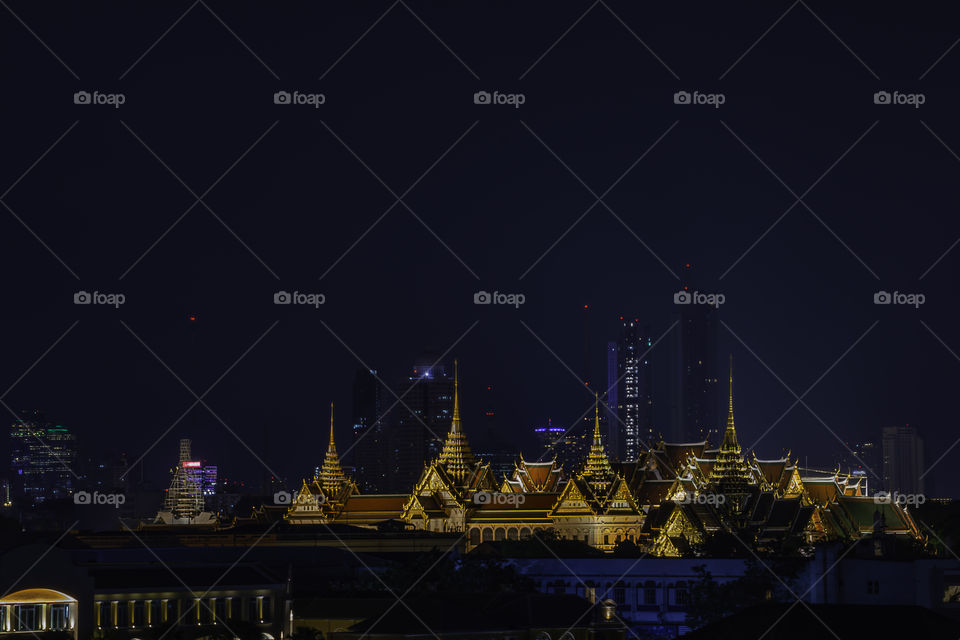 The beauty of the Golden palaces and phra keaw Temple at night in Bangkok, Thailand.