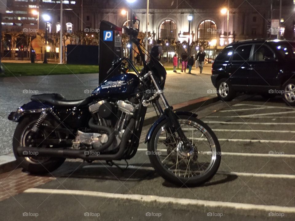 Motorcycle in City at Night 