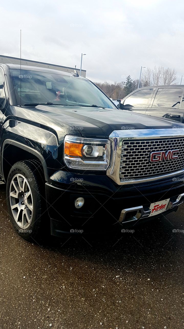 Brand new Chevy Denali! Went to look at new trucks and thought, what a perfect opportunity for a photo