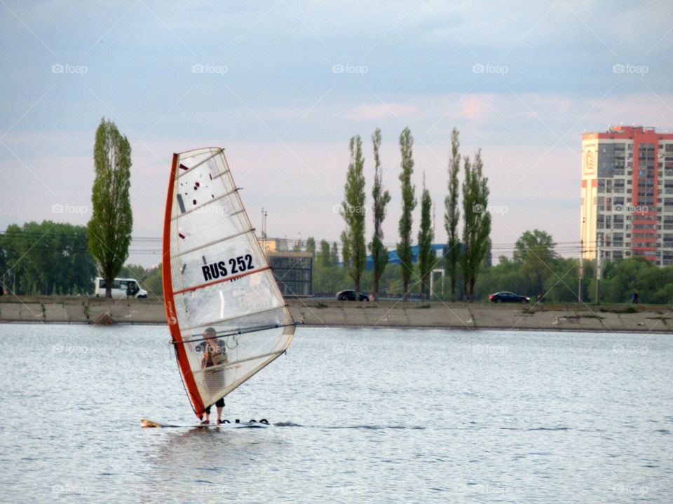 windsurfing on the river
