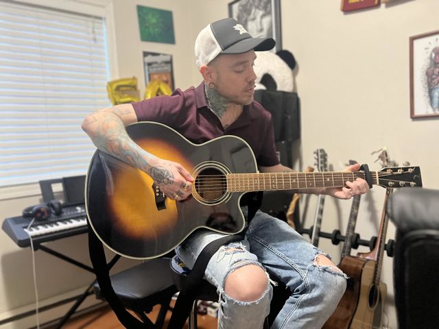 Dad playing guitar